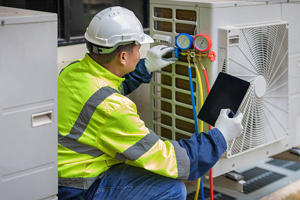 Professional Air Duct Cleaning technician working in Vinton, VA